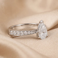 1.39 CT Pear Cut Solitaire Ring – Pavé Band