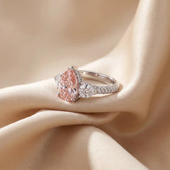 5.86 CT Pink Pear Diamond Three-Stone Ring