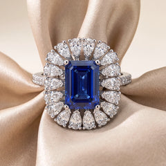 4.30 CT Emerald-cut Sapphire & Pear Diamond Halo Ring