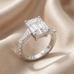 6.44 CT Emerald & Taper Three Stone Ring