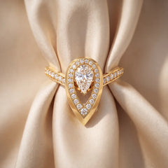 0.86 CT Pear Diamond Halo Chevron Ring