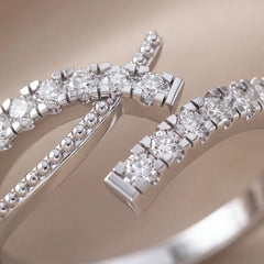 0.36 CT Round Diamond Crossover Bypass Ring