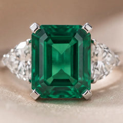 4.5 CT Green Emerald & Heart Three Stone Ring