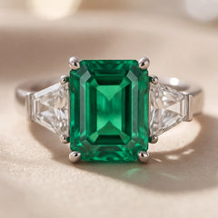 2.70 CT Emerald-cut Green Emerald & Taper Three Stone Ring