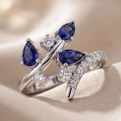 0.73 CT Pear Blue Sapphire Bypass Ring