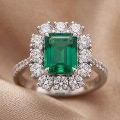 7.11 CT Emerald-cut Green Emerald Halo Ring