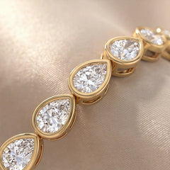 7.50 CT Pear Diamond Bezel Tennis Bracelet
