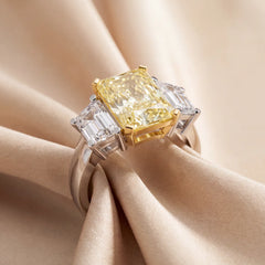 7.09 CT Radiant Yellow & Trapezoid Diamond Three Stone Ring