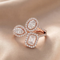 2.23 CT Pear, Emerald-cut & Oval Diamond Halo Trio Ring