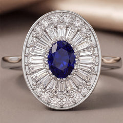 1.39 CT Oval Sapphire & Taper Diamond Halo Ring
