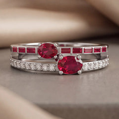 2.07 CT Oval Ruby Two-Stone Baguette Diamond Channel Ring