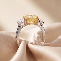 7.09 CT Radiant Yellow & Trapezoid Diamond Three Stone Ring