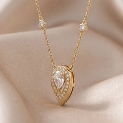 0.86 CT Pear Diamond Halo Pendant