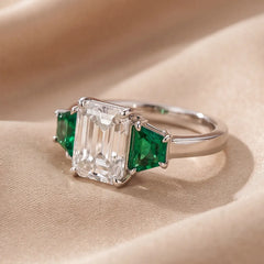 2.70 CT Emerald-cut & Taper Green Emerald Three Stone Ring