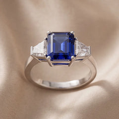 2.70 CT Emerald-cut Blue Sapphire & Taper Three Stone Ring