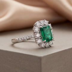7.11 CT Emerald-cut Green Emerald Halo Ring