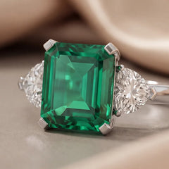 4.5 CT Green Emerald & Heart Three Stone Ring