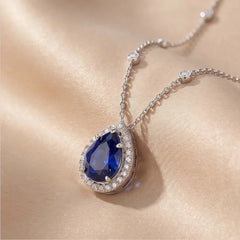 3.41 CT Pear Sapphire & Diamond Halo Pendant