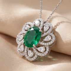 3.46 CT Oval & Pear-Cut Emerald Pendant