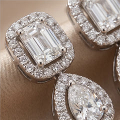 0.64 CT Emerald-cut & Pear Diamond Halo Drop Earrings