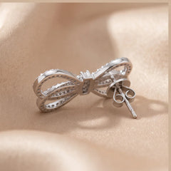 0.59 CT Diamond Bow Stud Earrings