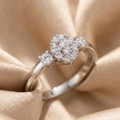 0.16 CT Round Diamond Oval Cluster Three-Stone Ring