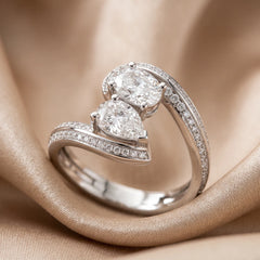 1.73 CT Pear, Oval & Round Diamond Bypass Ring