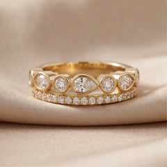 0.77 CT Pear & Round Two Row Diamond Ring
