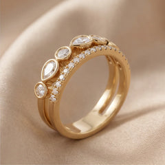 0.77 CT Pear & Round Two Row Diamond Ring