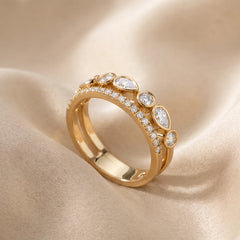 0.77 CT Pear & Round Two Row Diamond Ring