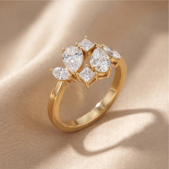 0.74 CT Pear, Marquise & Princess Diamond Cluster Ring