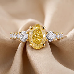 2.23 CT Oval Cut Three Stone Ring – Fancy Yellow Center, Pavé Band
