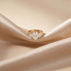 2.80 CT Oval & Pear Three-Stone Pavé Ring