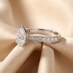 1.39 CT Pear Cut Solitaire Ring – Pavé Band