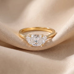 1.78 CT East-West Oval & Round Three-Stone Ring