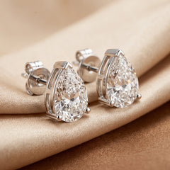 1.00 CT Pear Diamond Three Prong Stud Earrings