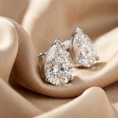 1.00 CT Pear Diamond Three Prong Stud Earrings