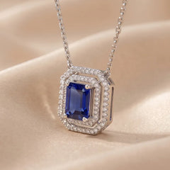 1.78 CT Emerald-Cut Sapphire Halo Pendant