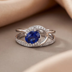 1.41 CT Oval Sapphire Swirl Halo Ring