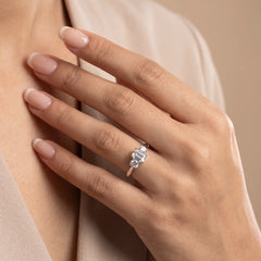 1.05 CT Emerald-Cut & Oval Three-Stone Ring