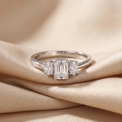 1.05 CT Emerald-Cut & Oval Three-Stone Ring