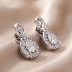 0.6 CT Pear Diamond Halo Infinity Twist Drop Earrings