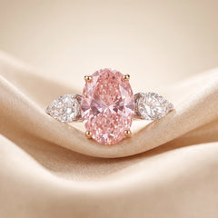 6.51 CT Oval Cut Three Stone Ring with Pink Diamond