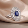 1.39 CT Oval Sapphire & Taper Diamond Halo Ring