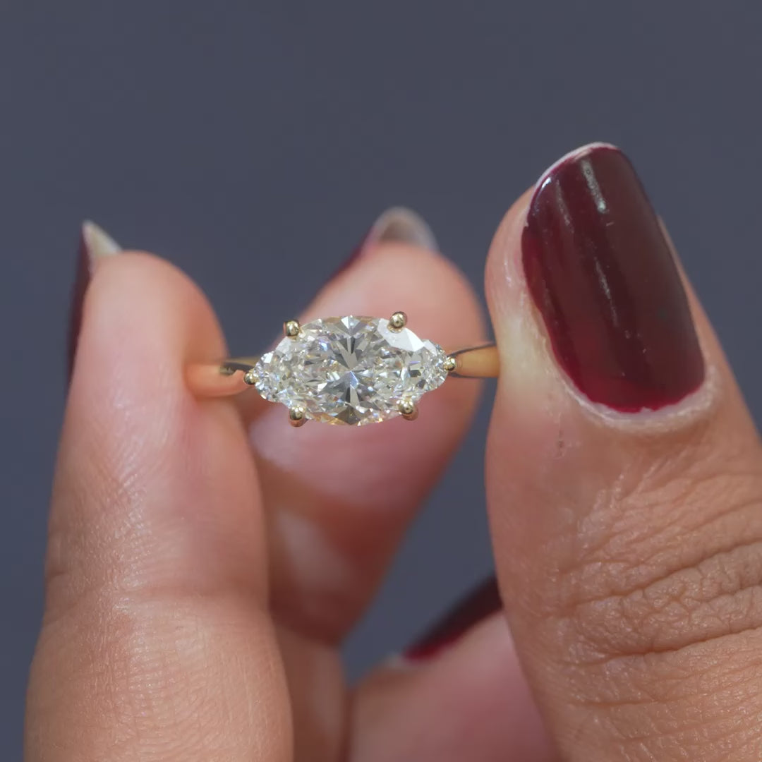 1.78 CT East-West Oval & Round Three-Stone Ring