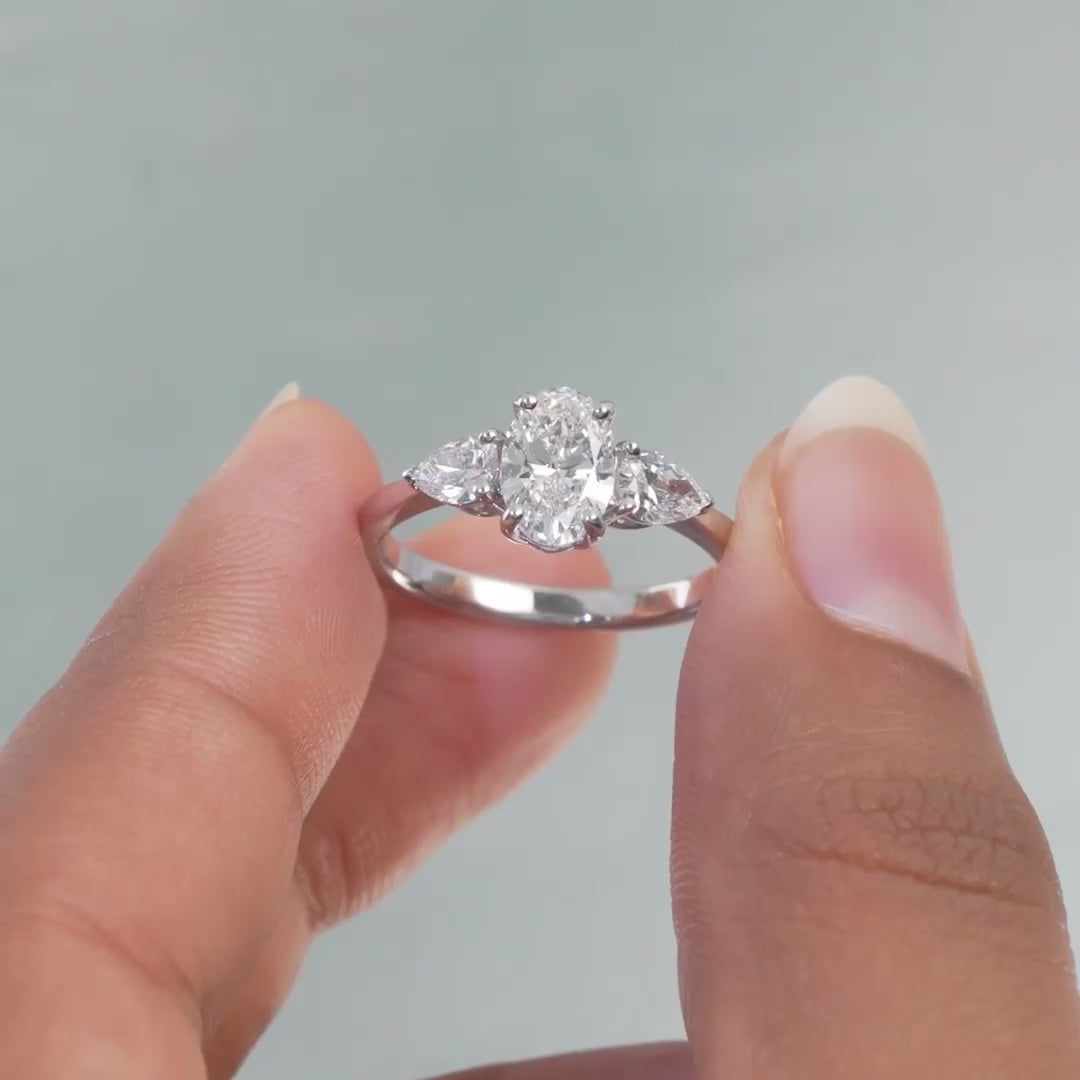 1.5 CT Oval & Pear Three Stone Ring