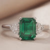 4.5 CT Green Emerald & Heart Three Stone Ring