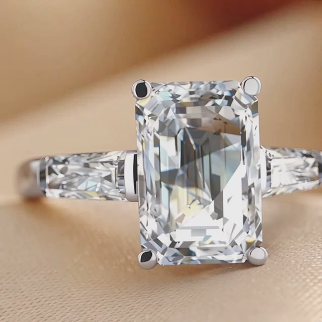 6.44 CT Emerald & Taper Three Stone Ring