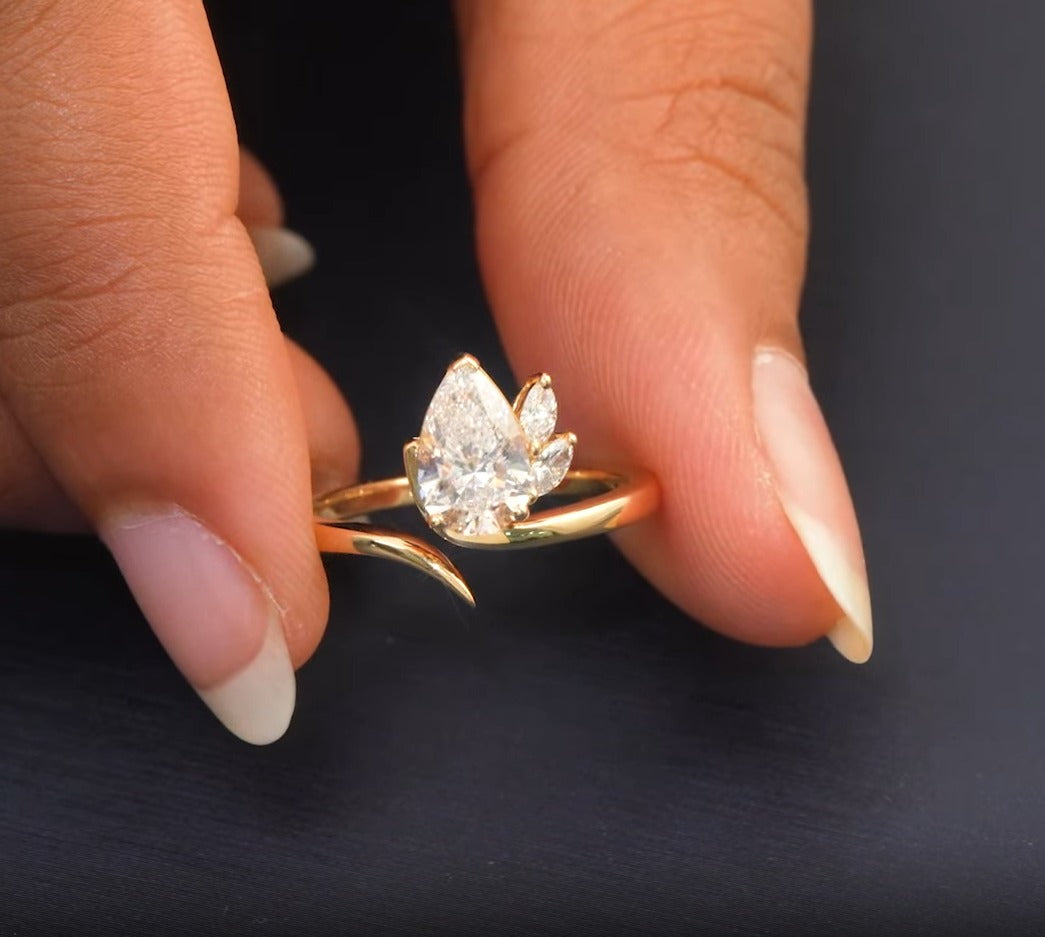 1.15 CT Pear Cut Cluster Ring with Side Diamonds