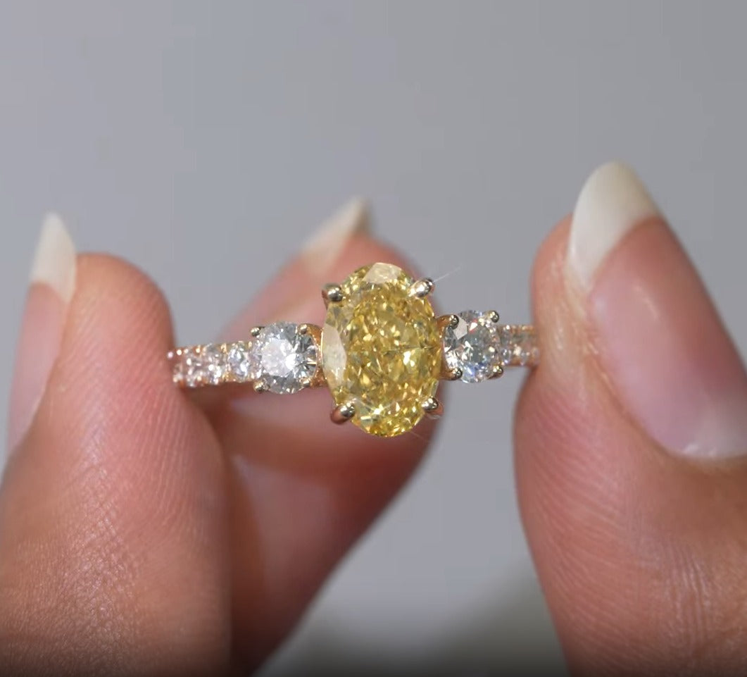 2.23 CT Oval Cut Three Stone Ring – Fancy Yellow Center, Pavé Band